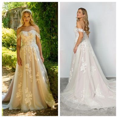 Elegant off-shoulder wedding gown with lace floral details and a flowing train.