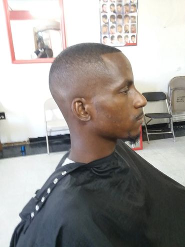 This is a classic, “D-boy fade”, it’s called dope because it’s a low maintenance cut, a $40 service.