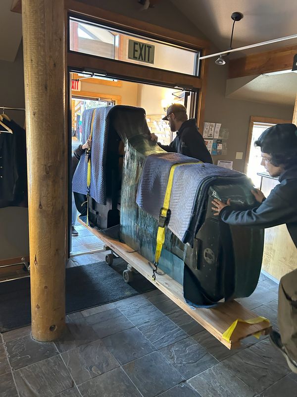 Bend Brothers Moving preparing concert grand piano to be moved to Bend Tower Theater Best Piano Move