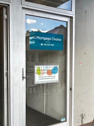 front door with Cultivation Counselling Sticker on door