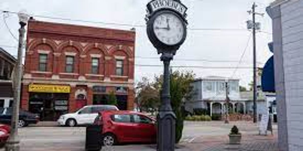Dpwntown Phoebus section of Hampton VA with antiquated clock in the town square.