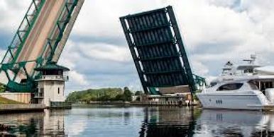 Bridge opening and boat about to go through opening. Your Hampton movers are dedicated to your move.