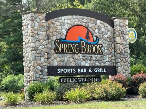 Stone sign for Spring Brook Sports Bar & Grill.