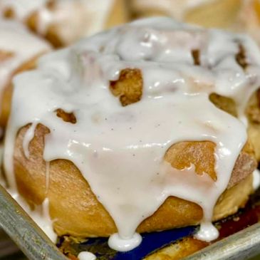 Ooey gooey, from scratch cinnamon rolls with vanilla bean icing