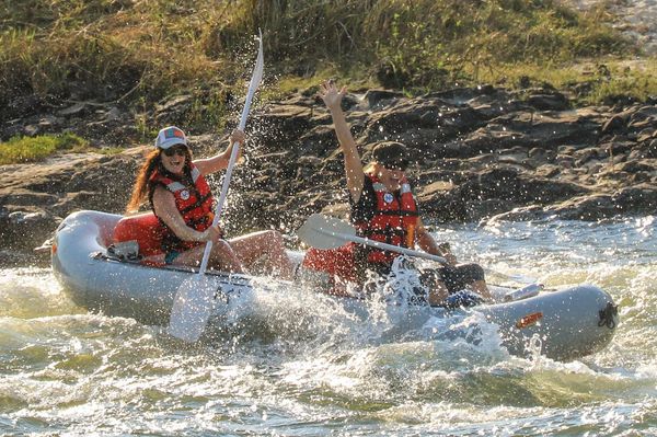 two women rafting down the upper Zambezi River from Victoria Falls, Zimbabwe