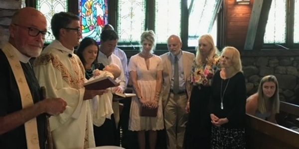 Holy Baptism with Fr Todd, Fr Craig Burlington, and David and Tammy Mallen.