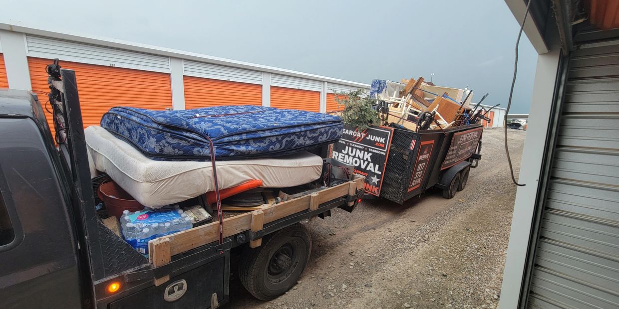 Mattress Removal with a load of junk being hauled away