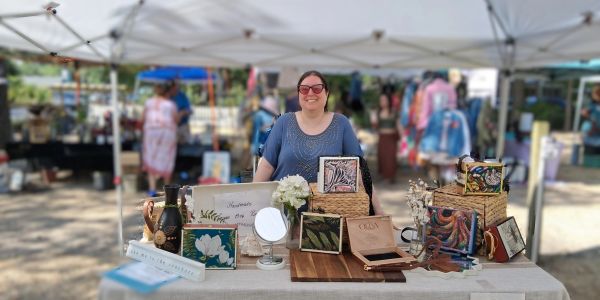 Handmade cigar box purses at the market.