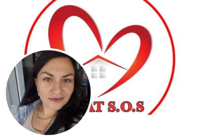 A woman smiling in front of a heart-shaped logo with a house symbol.