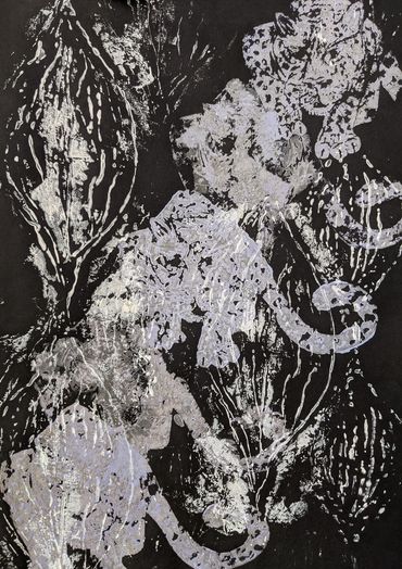 stamp created from dried hot glue strands overlaid with cheetah leopard stamps