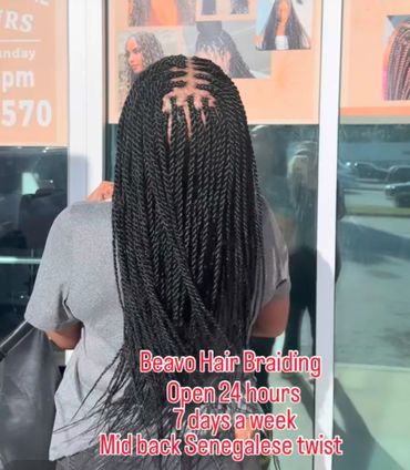 Mid-back length Senegalese twists styled at Beavo Hair Braiding, open 24/7.