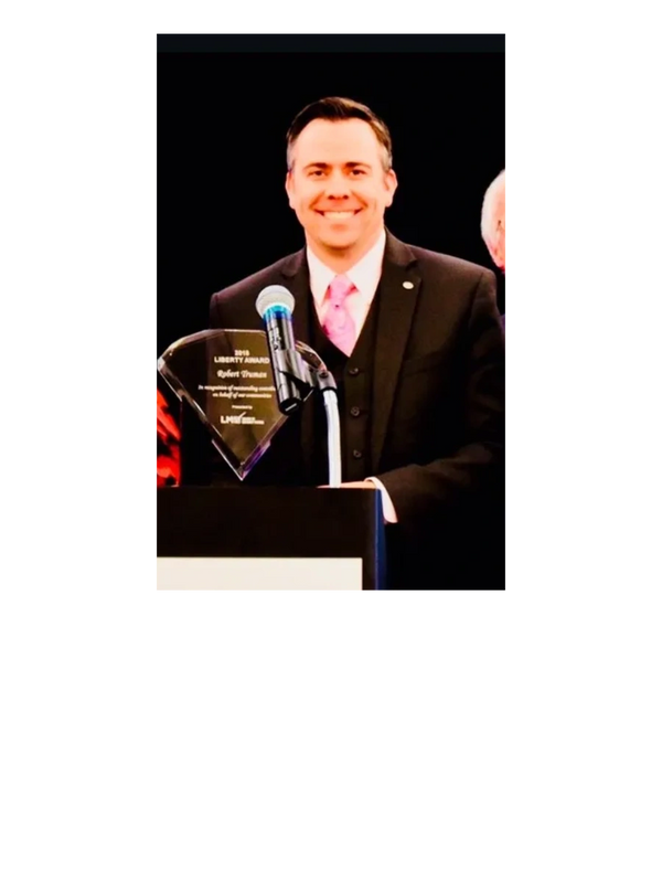 Founder Robert Truman at an industry awards ceremony