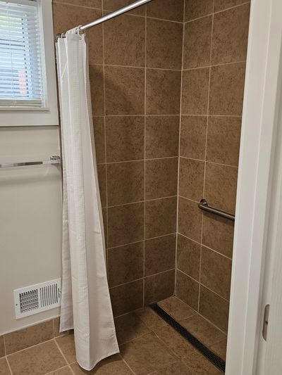 Large Barrier-Free Bathroom | Hidden Harbors Memory Care Center  | Share Street | Macomb County
