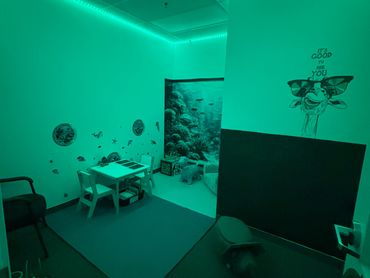 Children's hearing waiting room in green