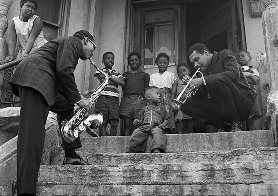 Picture of Benny Golson and Art Farmer with Harlem children, by Ted Williams