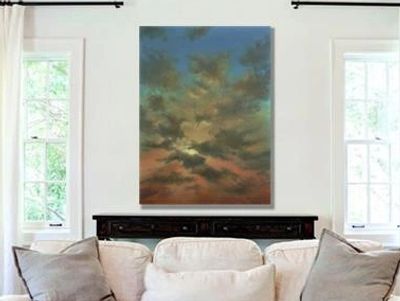 Sky Burst, an original sunset painting by Alan Zawacki as the focal point on wall.