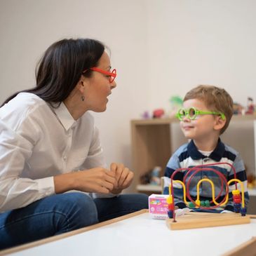 Child therapist conducting play therapy and child therapy