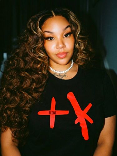 Model wearing signature Abstract TK teeshirt.