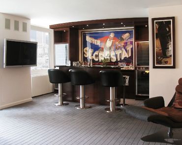 Mahogany Modern bar with built-in wine coolers