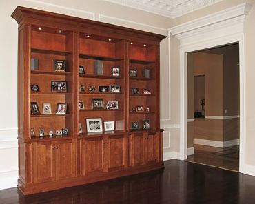 Item: LIB028 – Cherry Traditional style unit with recessed panel doors.