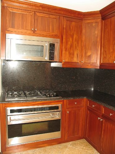 Item: KTC007B – Cherry Traditional style with granite top and back splash.