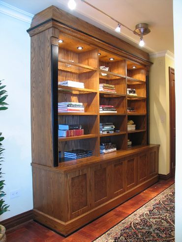 Item: LIB015 - Oak, Paint Transitional style unit with framed glass shelves.