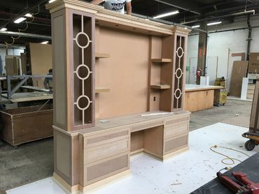 A wooden display for a television