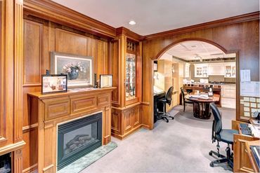A living room leading to a kitchen