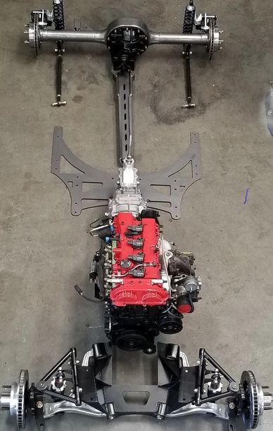 MGB restomod suspension system upgrade turbo 2.0L engine swap torque arm