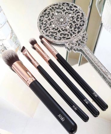 adorn U personalised makeup brushes look picture perfect on a mirror dressing table.
