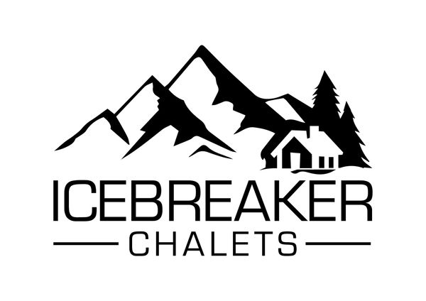 Logo of Icebreaker Chalets with mountains, trees, and a cabin.