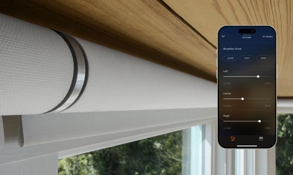 Smartphone controls window blinds near a wooden ceiling.