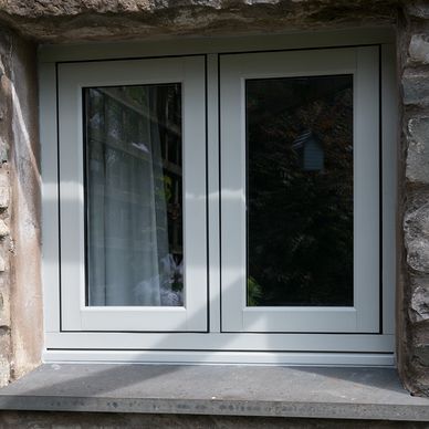 Agate Grey flush casement window on heritage stone property
