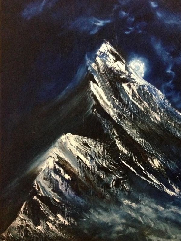 A glowing moon over snowy mountain peaks at night.