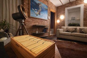 Cozy living room with vintage decor and a wooden file organizer.