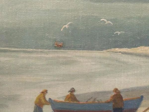 Three people with a boat on a beach with seagulls and a ship in the distance.