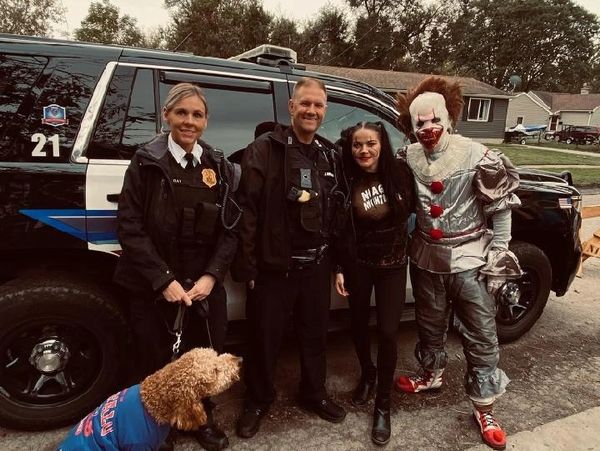 Photo of Remy with Lt. Day & Officer Snopkowski at Trunk or Treat