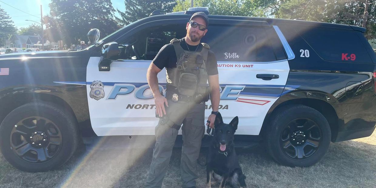 Photo of Officer Jeff Kam and his K9 partner Stella 