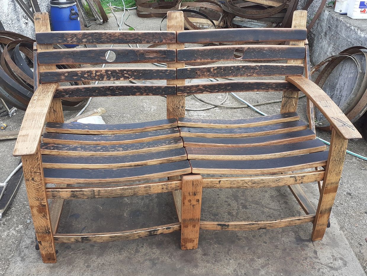 a whisky barrel stave double bench seat waiting to be delivered