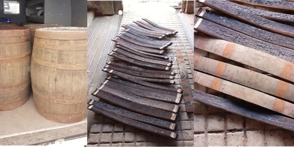 the raw materials for our products hogshead whisky barrels and a pile of barrel staves