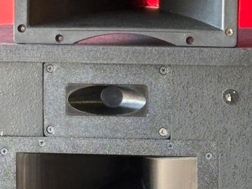 Close-up of a speaker's horn and tweeter components.