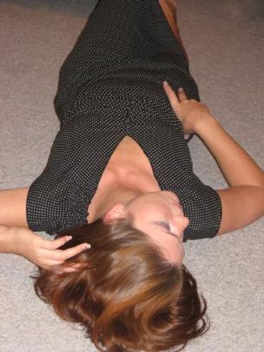 Model lying on back with hair highlighted. Photo by Mina Koury Martin