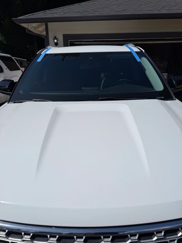 Windshield replacement with blue tape