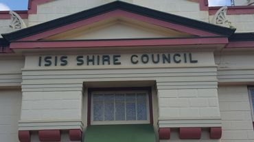 Facade of the ISIS Shire Council building with architectural details.