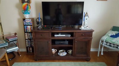 custom wood furniture, TV cabinet in use