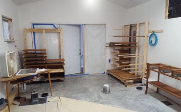 Inside our finish room with the hall tables in progress.