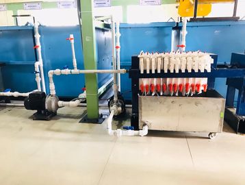 Industrial water treatment system with pipes and filtration units.