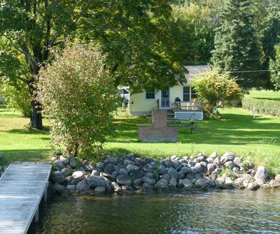 view of the Bungalow rental cottage on Honeoye Lake from one of our two docks