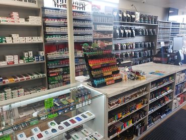 Cigarette and rolling tobacco shelves inside the Waterford, MI store