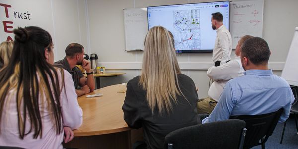 staff in meeting at  - Highway Assurance Ltd